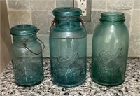 3 blue Ball canning jars
