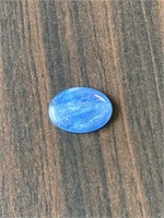 12.66 Cts Natural Kyanite. Oval cabochon. IDT cert