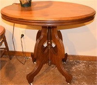 Antique Oval Wood & Milk Glss Casters Parlor Table