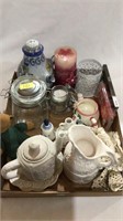 Candles, teapots, tea set, doilies