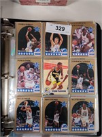 Binder of NBA cards from late 80s - early 90s