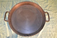 Large round cast iron dual handle pan