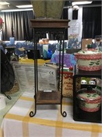 Wicker and metal plant stand