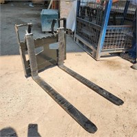 Unused Mini Stand on Skidsteer Forks