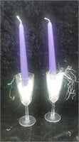 Pair of champagne flutes turned into candle