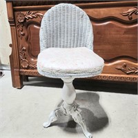 Antique wicker swivel chair w/ cast iron legs
