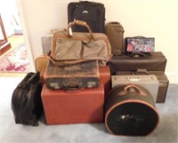 Large Suitcase lot to include approx. 12 suitcases