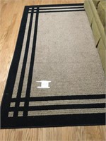 Area rug. Approximately 8’ x 5’