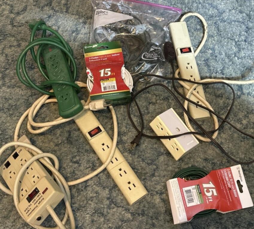 Group of surge protectors and extension cords