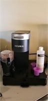 Kerrigan coffee pot, pod display, coffee grinder