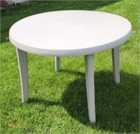 42" round plastic table.