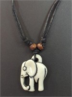 Hand carved bone elephant pendant with necklace
