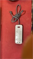 Surge protector extension cord with USB ports