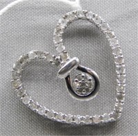 Sterling Silver diamond heart pendant.