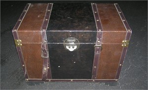 Leather storage trunk with straps