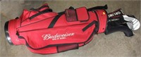 (2) golf bags with golf clubs