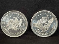 Pair of silver bullions 1985 liberty silver,