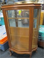OAK BOW FRONT CHINA CABN WITH SHELVES FRONT PLEXI