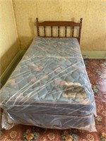 Twin bed with new mattress and box spring
