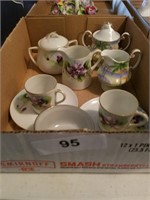 Handpainted cups, saucers, pitchers
