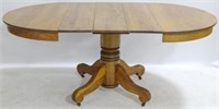 Round Oak Pedestal Table w/ 3 Leaves