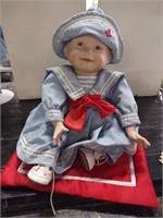 Porcelain Doll w/Cloth Body on Satin