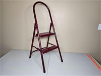 Red metal step ladder