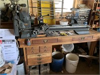 Craftsman metal lathe on stand and includes