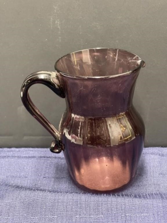 Handblown cranberry glass pitcher