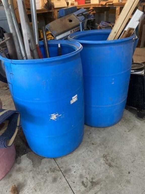 2 blue barrels full of misc