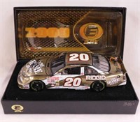 New Elite signed Tony Stewart #20 diecast car in