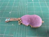 Vintage guitar/cherub needle pin cushion.