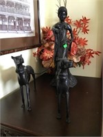 Metal Sculpture With Dogs