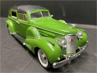 1938 Cadillac Fleetwood. Die cast and plastic.
