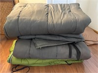 Grouping of 4 sleeping bags