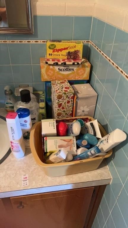 Variety bathroom lot with Tissue boxes, shampoo,