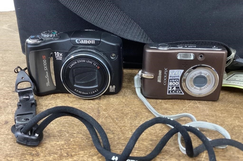 2 digital cameras with bag & accessories