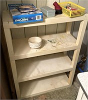 White storage shelf and contents