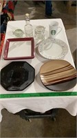 Decorative plates, coffee mug, glass canisters.