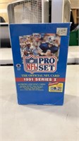 Lot of football cards factory sealed in box.