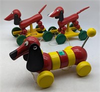 (M) Vintage wooden Dachshund pull toys. largest