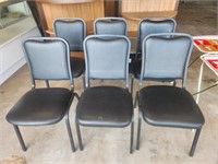 Six Stacking Cushioned Chairs