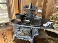 Miniature Cast iron Crescent Cook Stove