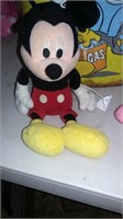 MICKEY AND MINNIE WITH A METAL CAN