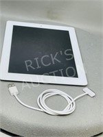 iPad with charger - unlocked & reset