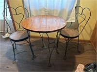 Three-piece ice cream set… Table and two chairs