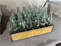 OLD WOOD COCA COLA CRATE WITH OLD GLASS BOTTLES