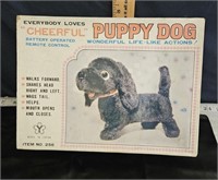 cheerful puppy dog in original box