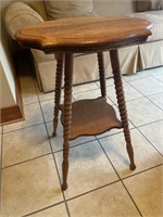 Turned leg oak  parlor table 28 inches high 21