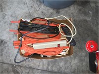 lot of extension cords and surge protectors